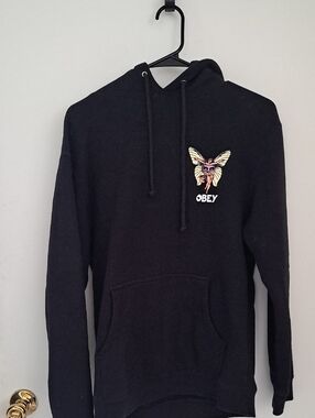 Obey Men’s Black Crewneck Hoodie with Moth Chest Graphic